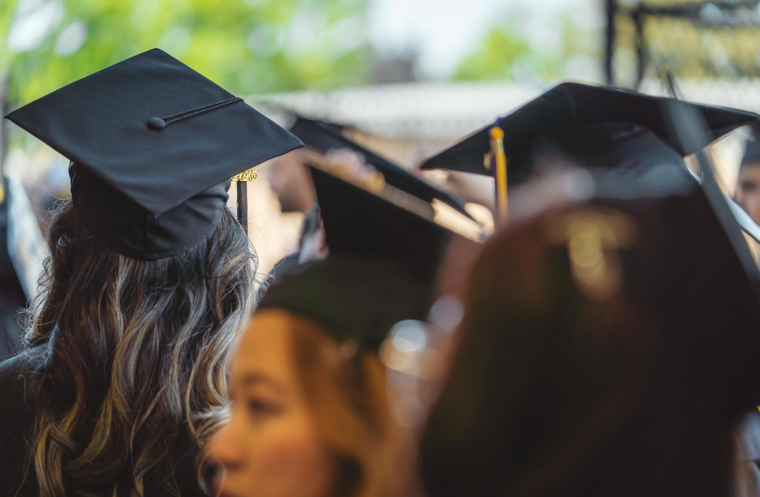 Image of graduates in cap and gown